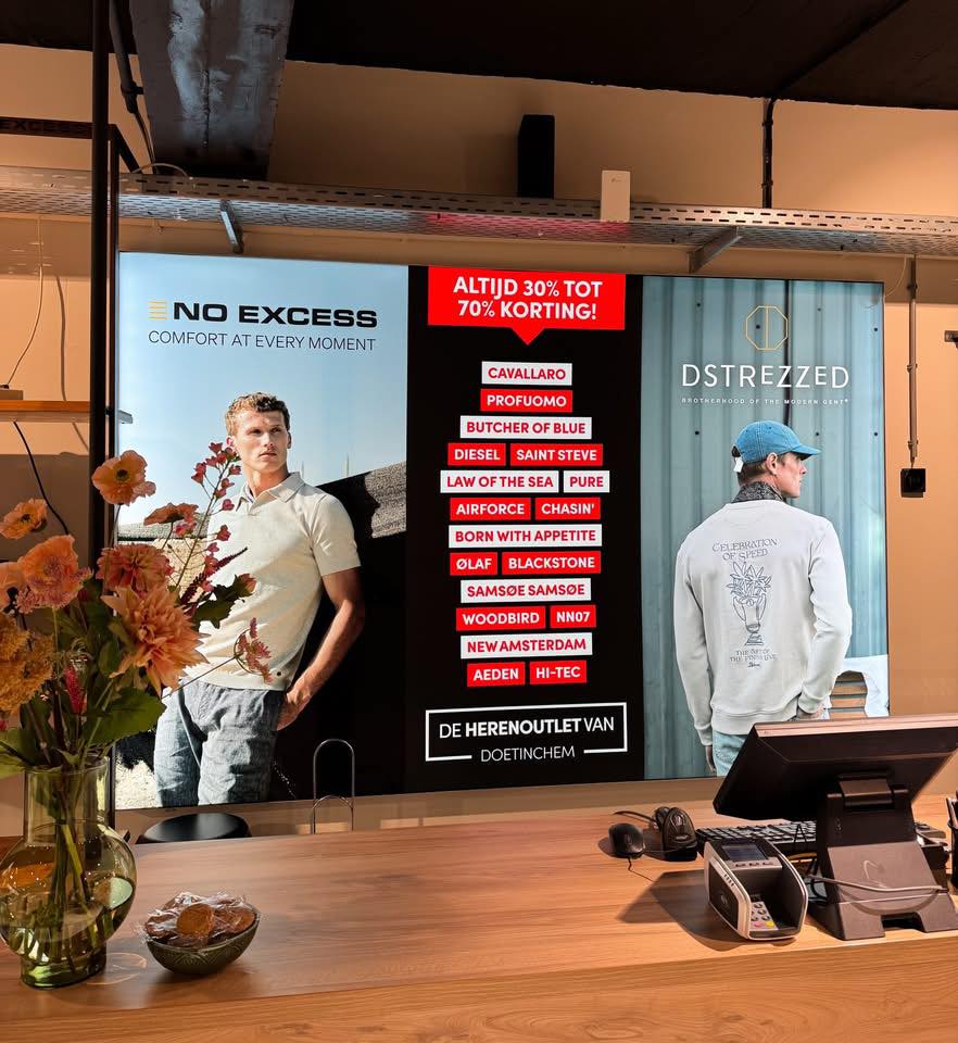 Peesdoeken bij kassa Peesdoek met merkenoverzicht en kortingspercentage bij kassa