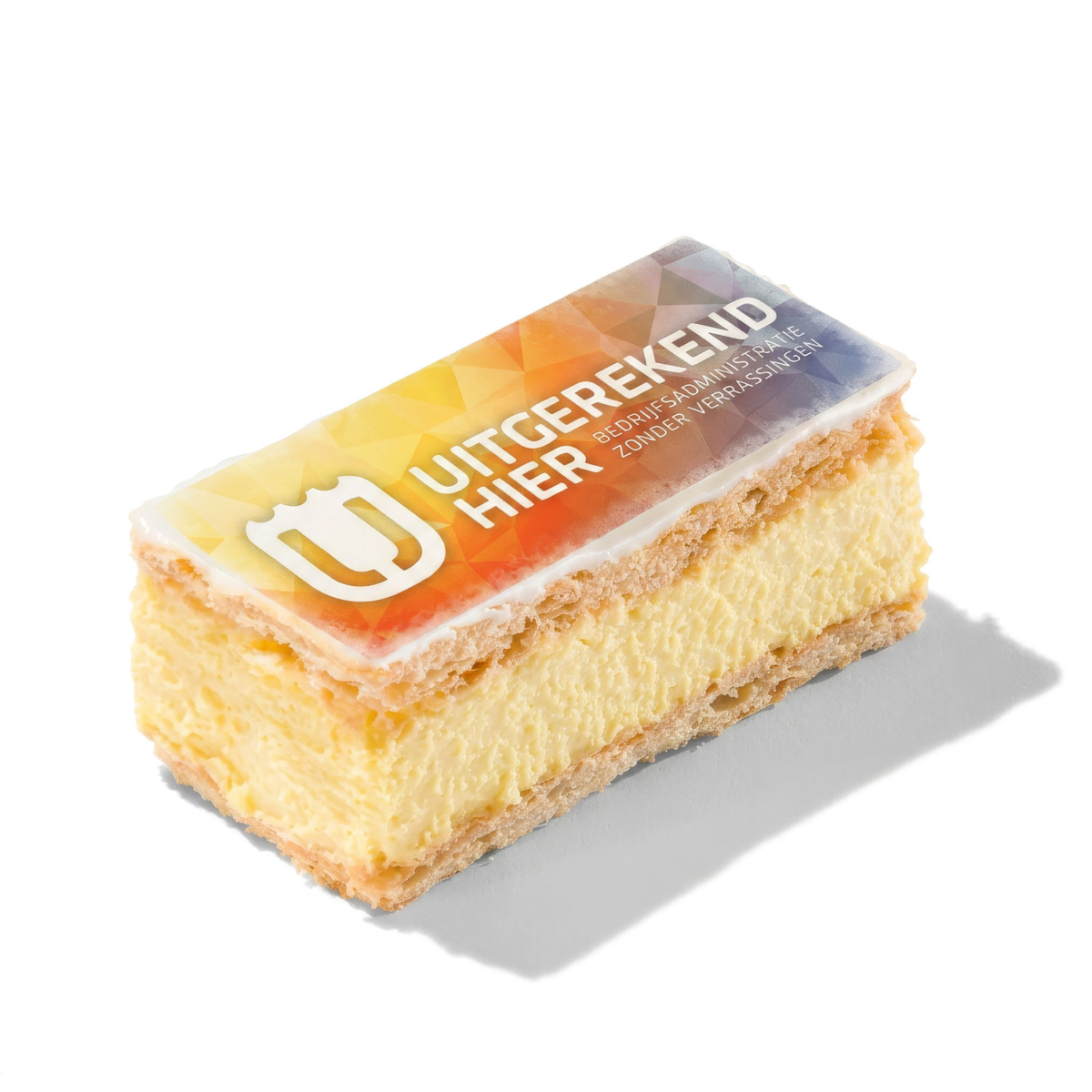 Tompouce met huisstijl Uitgerekend Hier Tompouce bedrukt met de volledige kleurrijke huisstijl van Uitgerekend Hier, logo diapositief uitgespaard